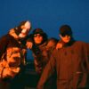 Kneecap, intervista: “Musica e politica sono inseparabili. E non cambieremo lingua per piacere a tutti”